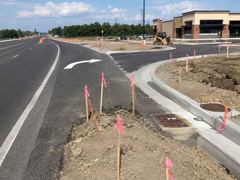 Construction staking for a new commercial turn lane and driveway entrance in Pensacola Florida.
