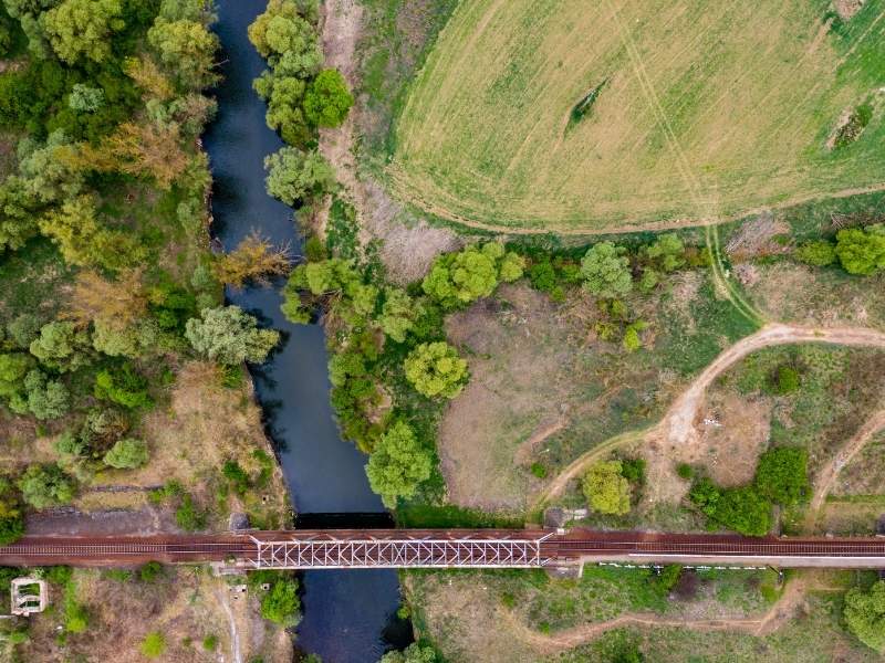 LiDAR mapping aerial view of an active railroad corridor with surrounding terrain and drainage near Pensacola, FL.